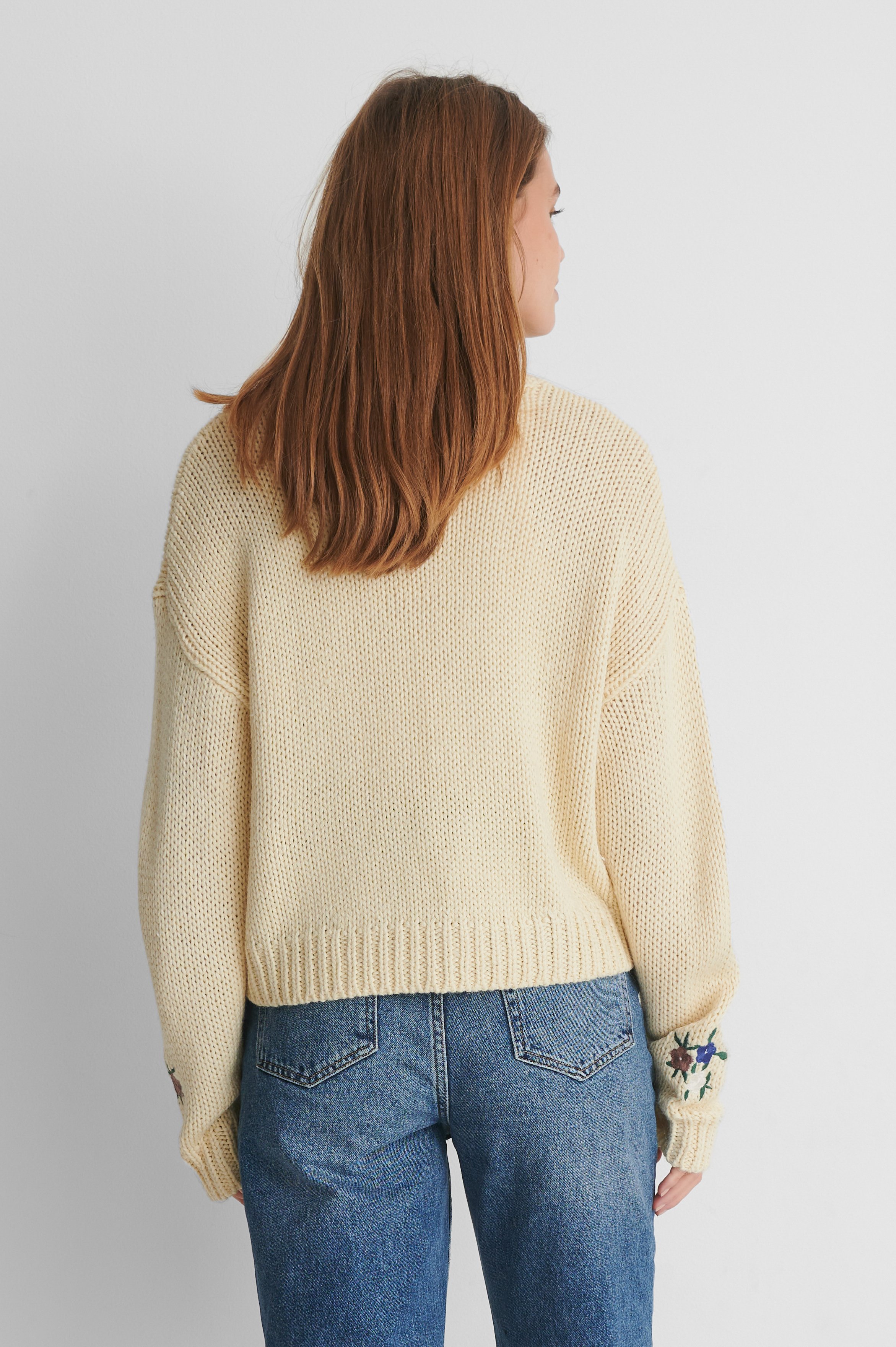 White Flower Embroidery Round Neck Knitted Sweater