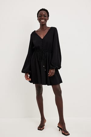 Black Flowy Long Sleeve Mini Dress